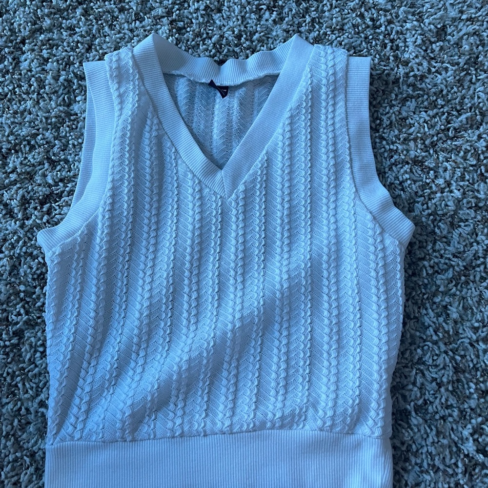 white sweater vest